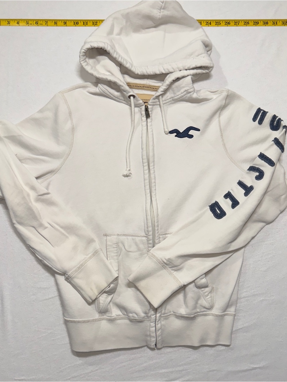 Y2K Hollister White Zip-Up Hoodie with Navy Logo and Sleeve Letters 2000s